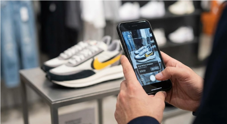 Man scanning shoes with phone - Webtonic Shopping with your senses